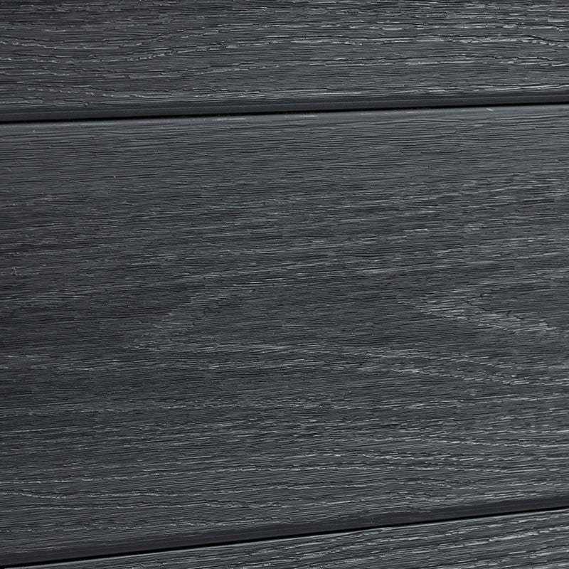 Close-up of black composite fence panel showing wood-grain texture and horizontal board detail